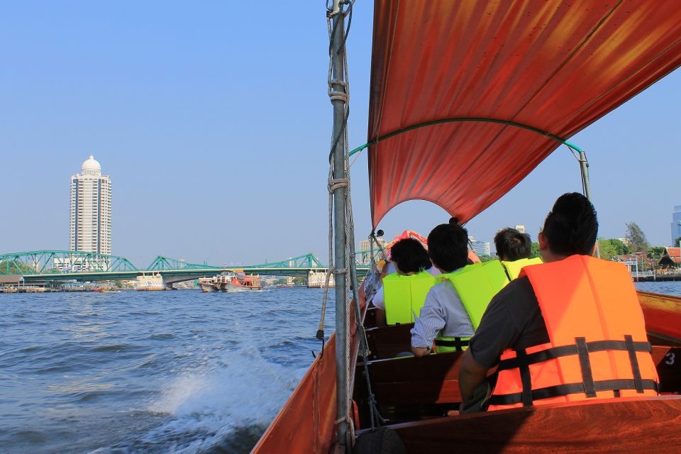 Bangkok: 2-Hour Canal Tour by Teak Boat - Temples From the Water: More Than Just Landmark Sightseeing