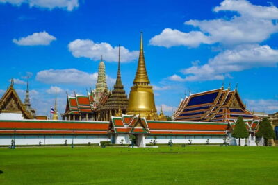 Bangkok: Grand Palace, Wat Pho, Wat Arun Sacred & Local Tour - Getting there and moving around: riverboat, tuk-tuk, and short travel legs