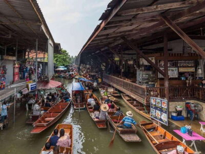 Bangkok: Railway and Floating Market Tour with Dragon Temple - Getting to Maeklong Railway Market: Train-Track Market Magic
