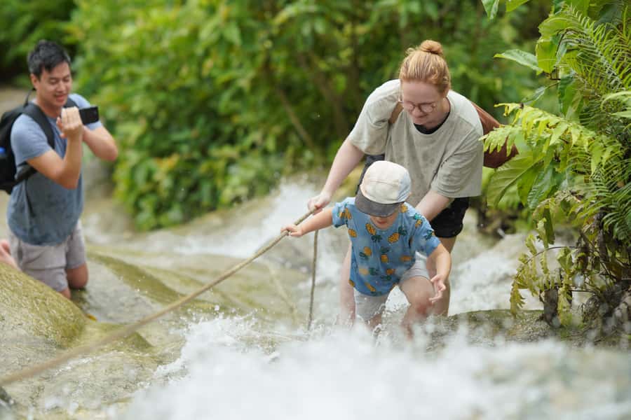 Chiang Mai: Bua Thong Sticky Waterfall and Huge Cave Tour - Nam Phu Chet Si: The Mineral Geyser Stop That Breaks Up the Wet Climbing