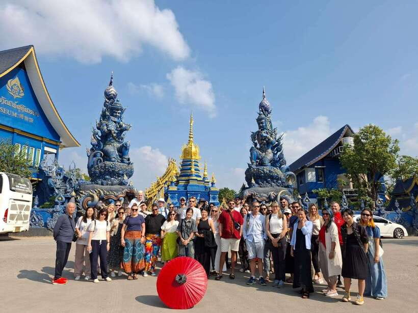 Chiang Mai: Chiang Rai Temples, Karen Tribe and Hot Springs - Wat Rong Suea Ten (Blue Temple): calm light, gold accents, and dragon guards