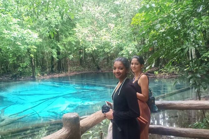 Discover Krabi - Emerald Pool, Hot Springs & Tiger Cave Temple - Namtok Ron hot spring waterfall area: warm cascades and cool breaks