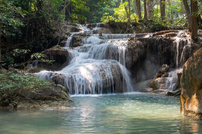 Erawan Waterfalls and Bridge Over River Kwai Tour from Bangkok - Stop 3: Erawan National Park break, lunch on your own