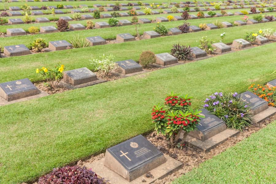 From Bangkok: Elephant Sanctuary and Kanchanaburi Tour - Bridge on the River Kwai and the war cemetery: brief, moving, and worth your attention