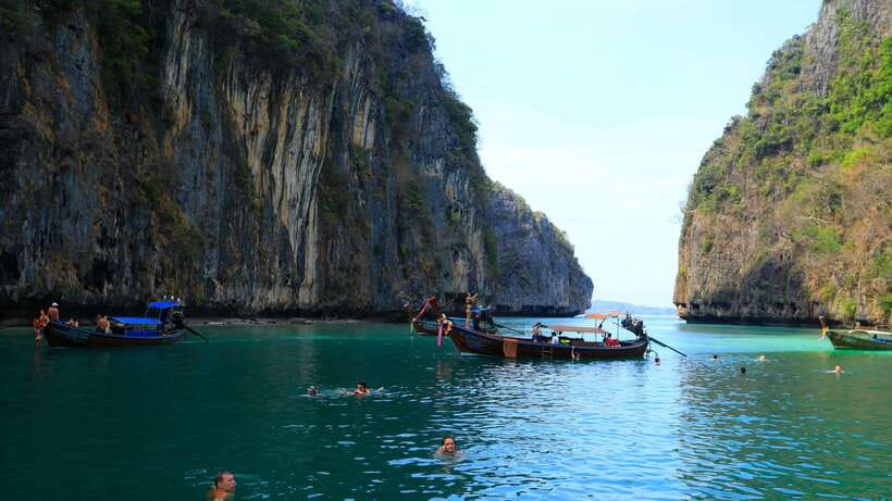 From Phi Phi: Full Day 7 Island Tour by Longtail with Sunset - Food, water, and the small comforts that make or break it
