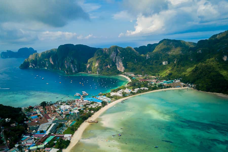 From Phuket Or Khao Lak: Phi Phi Islands Early Bird Tour - Pileh Lagoon swim break: where the day feels human again