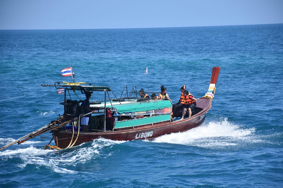 Koh Lanta: 4 Islands and Emerald Cave Tour by Long-tail Boat - Koh Chueak snorkeling: coral reefs on a karst island