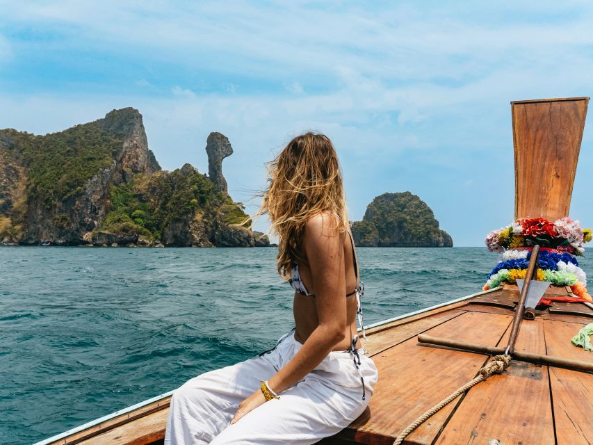 Krabi: 4 Islands Tour by Longtail Boat & Thai Buffet Lunch - Poda Island: snorkeling, swimming, and the beach lunch break