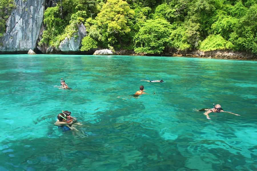 Krabi: Phi Phi Island Sunset Maya Bay and Four Islands Tour - Price and park fees: what $66 really buys you