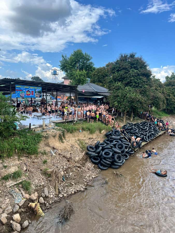 Pai: Jungle Tubing River Excursion with DJs & Foam Party - Check-in at Revolution Hostel and the first transport shuffle