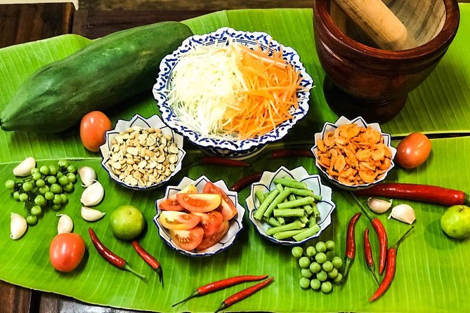 Pink Chili - Thai Cooking Class and Market Tour in Bangkok - The Cooking Lesson: Building Red Curry, Soup, and Spring Rolls at the Wok