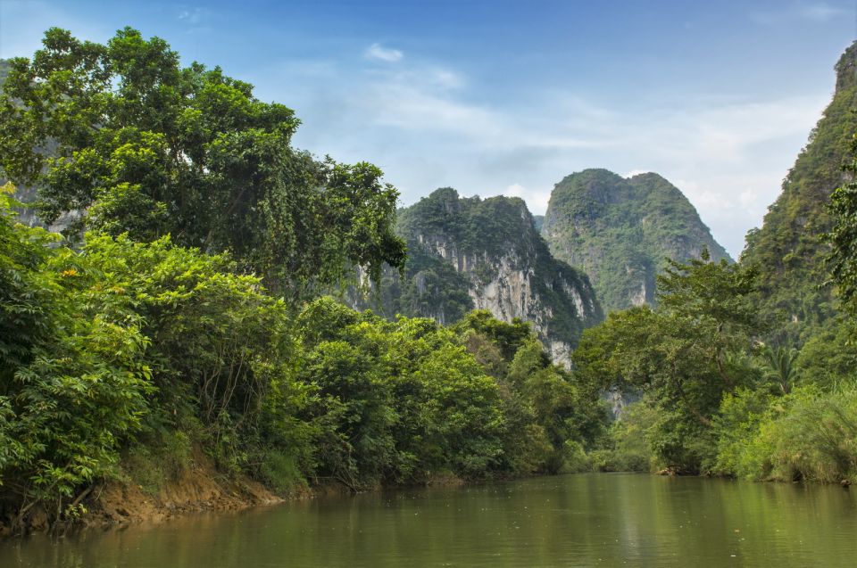 Sok River: Bamboo Raft Ride, Monkey Temple & View Point Tour - The Sok River bamboo rafting: slow water, limestone walls, and a real coffee break